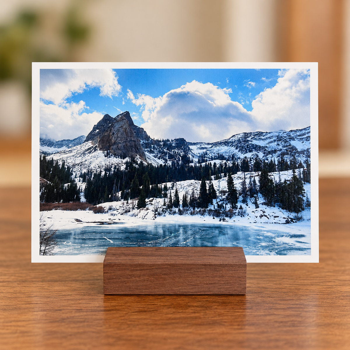 Glacier Peak snowy mountain lake landscape photo print displayed in a wooden stand