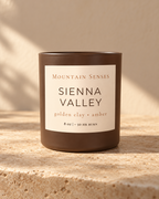 Sienna Valley Ritual Refill candle, front view on a warm neutral stone surface