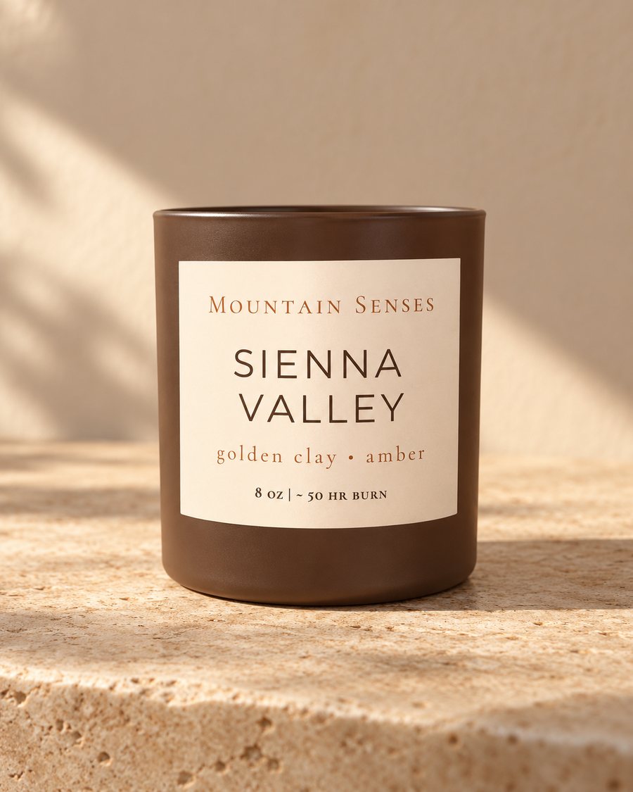 Sienna Valley Ritual Refill candle, front view on a warm neutral stone surface